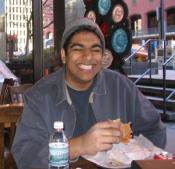 Our buddy Anuj eating a Pork Belly's sandwich